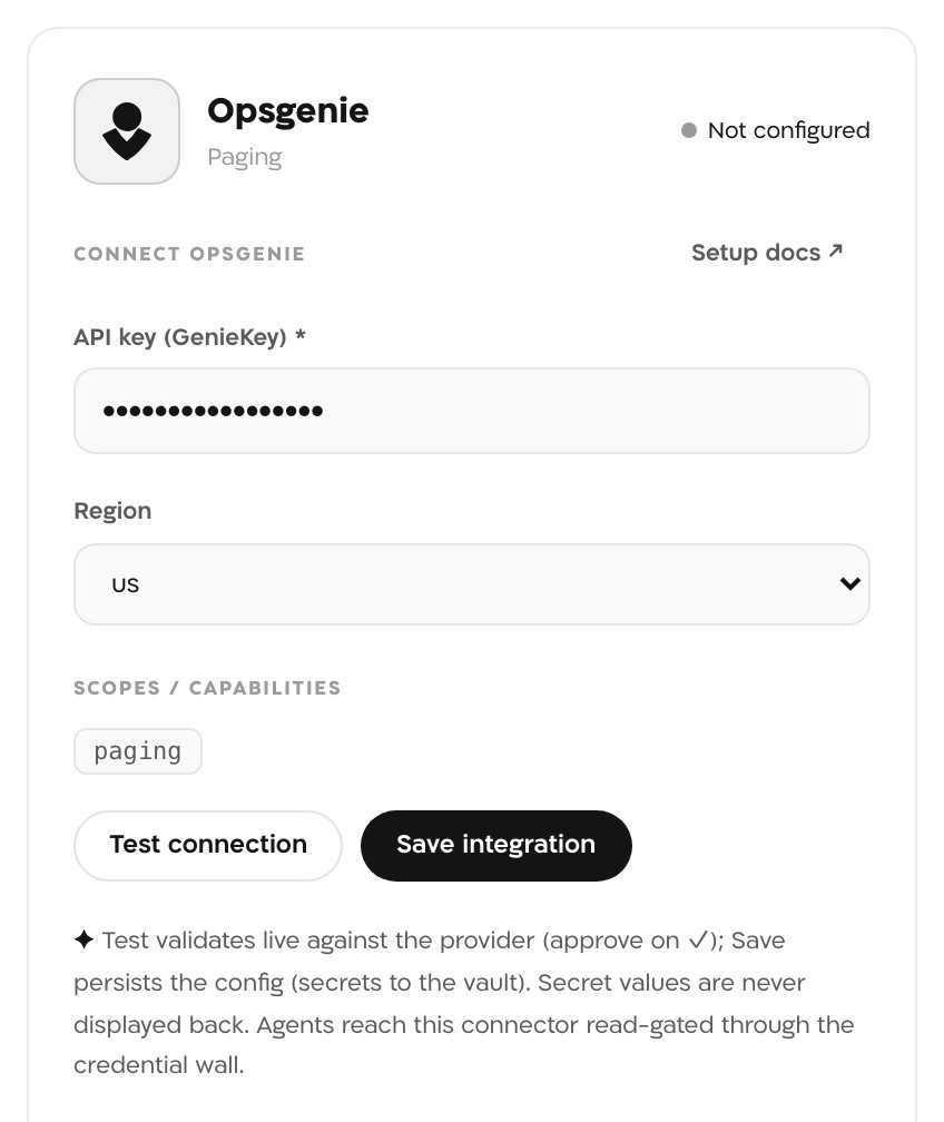 Landfall's Opsgenie panel, Not configured, with the API key (GenieKey) masked, Region set to us, the scope chip paging, and Test connection and Save integration buttons.